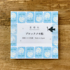 Seidosha Square Memo Pad BM-028 pack with floral cover design on a wooden surface