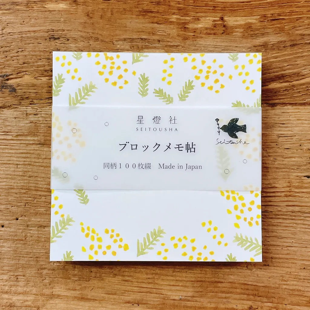 Seidosha Square Memo Pad BM-411 with its floral cover design on a wooden surface