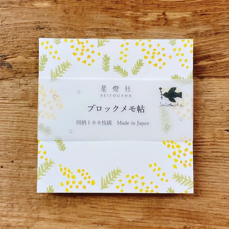 Seidosha Square Memo Pad BM-411 with its floral cover design on a wooden surface