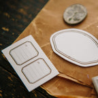Decorative elements on brown paper with a fountain pen
