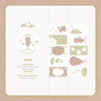 Kuma label stickers with bear illustrations on a beige background