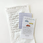 Set of small notepads with various designs on a white background