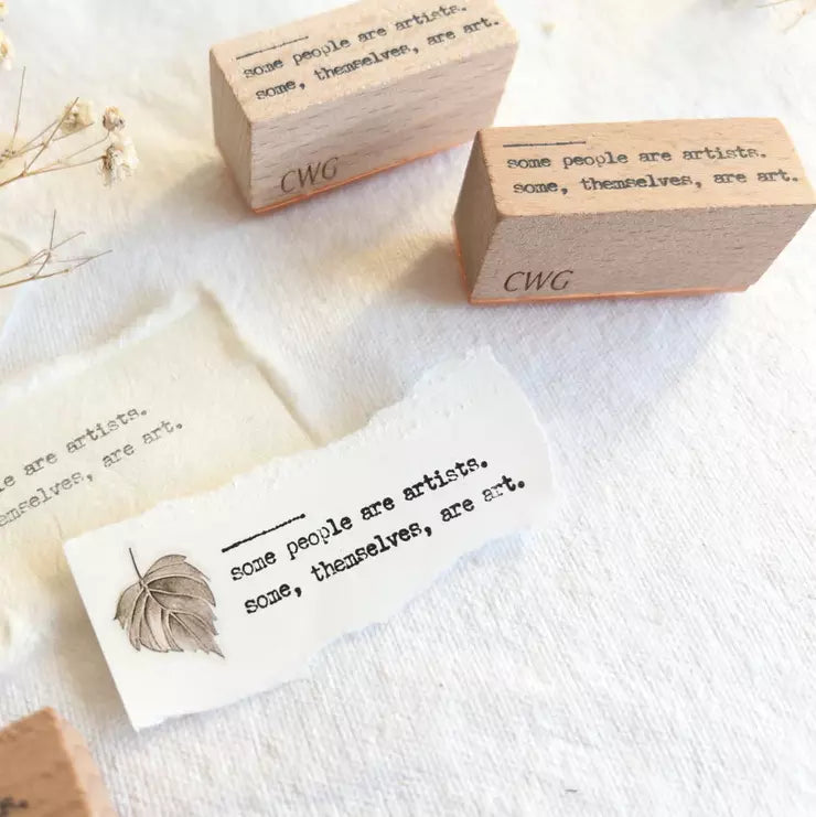 Some People Are Artists Rubber Stamp engraved wooden blocks on a white fabric background