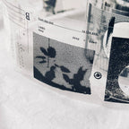 Black and white graphic design on a textured surface