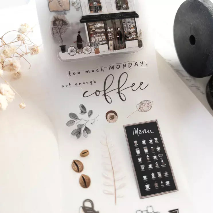 Notebook decorated with Soul Cafe PET Tape coffee text and illustrations on a light surface