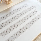 Spring cottage washi tape strips with small floral pattern in soft neutral tones on white background