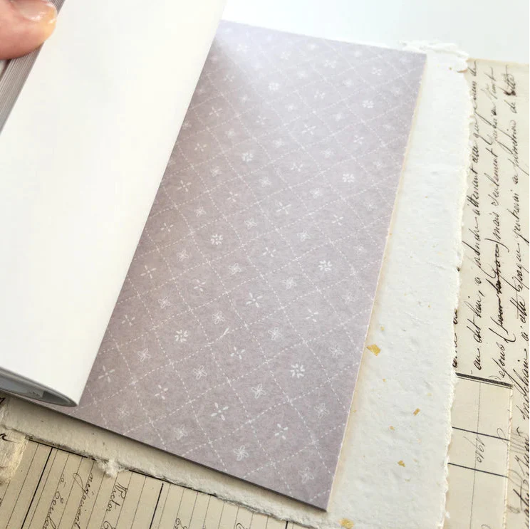 Neutral patterned washi sticker sheet with tiny floral grid design in muted taupe