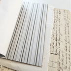 Thin striped washi sticker sheet with mixed line weights in neutral palette