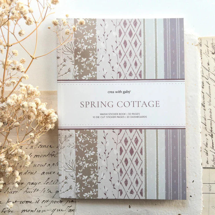 Spring Cottage Washi Sticker Book flat lay with dried flowers on a textured paper backdrop