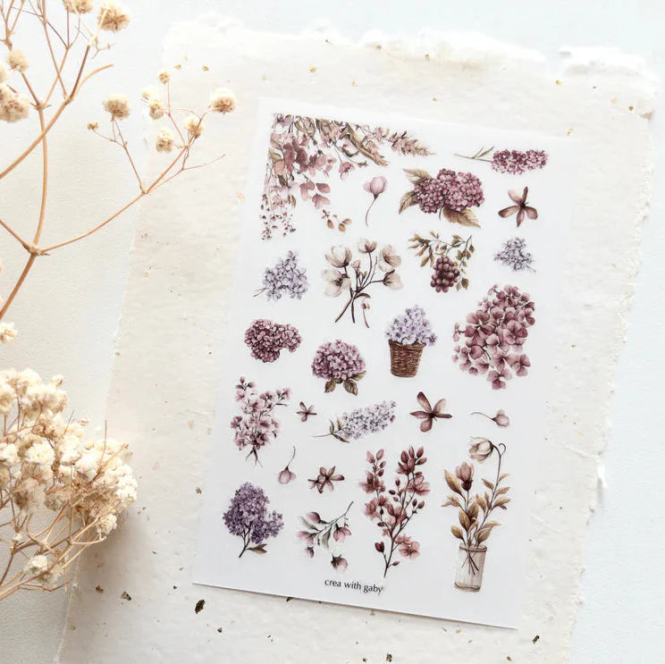 Spring garden transfer sticker sheet with soft pastel floral illustrations, botanical elements, and vintage-inspired journaling designs