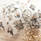 Set of postcards with scenic and architectural illustrations on a textured surface.