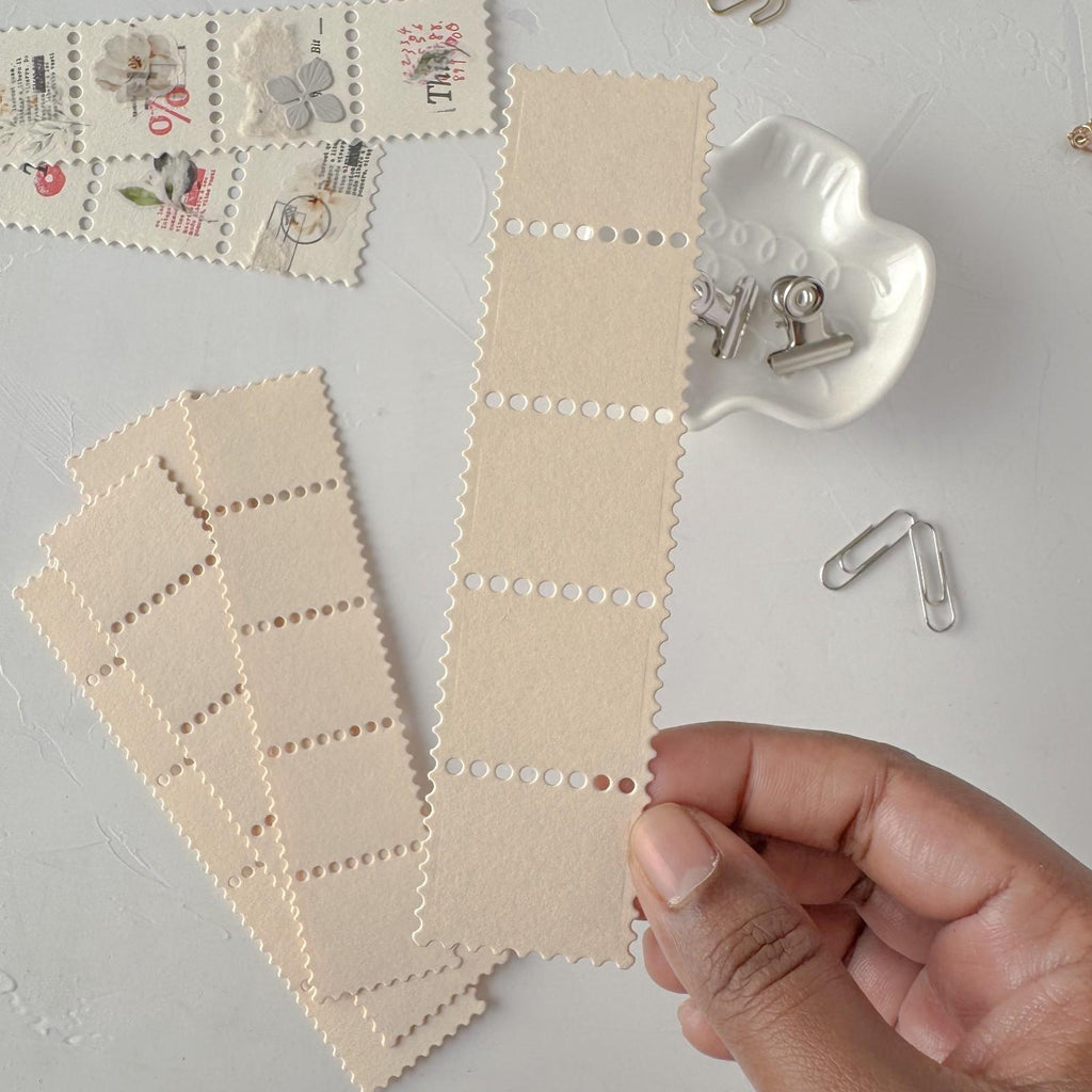 Beige fabric swatches with decorative elements on a light gray surface.