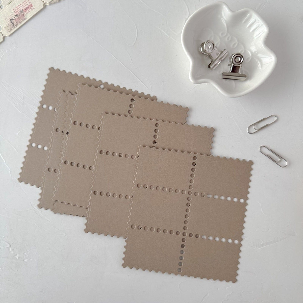Coffee Stamp Card Vol. 3 square cards with perforated edges displayed on a white surface