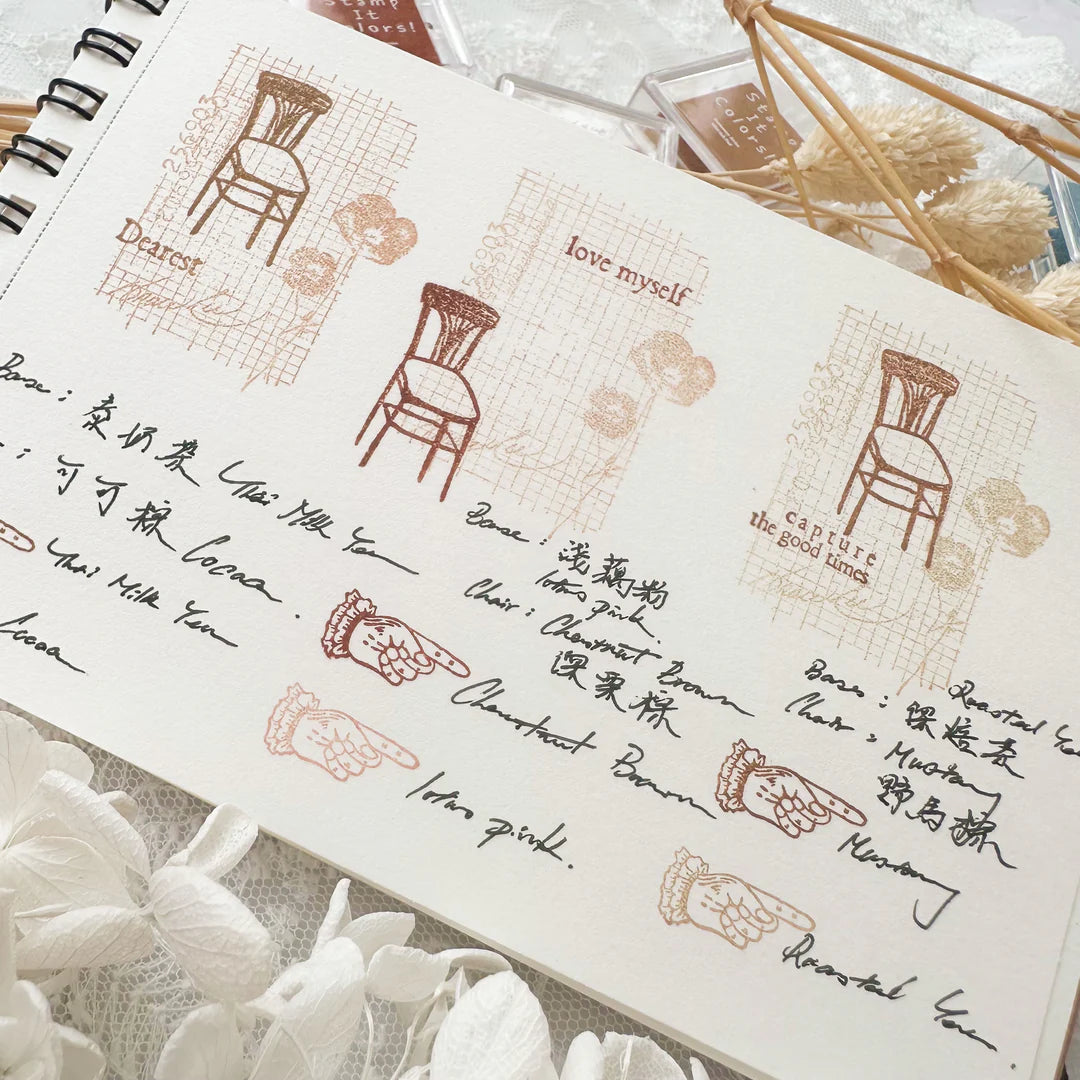 Notebook with printed designs and text on a textured surface