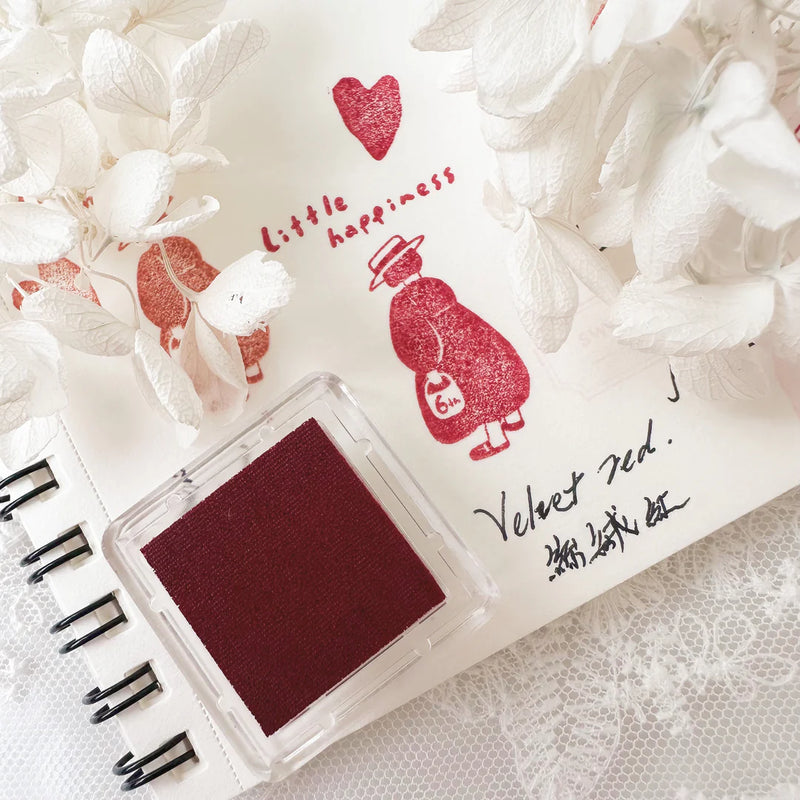 Red Velvet Stamp Ink Pad with a Little Happiness stamped sample and deco elements on white