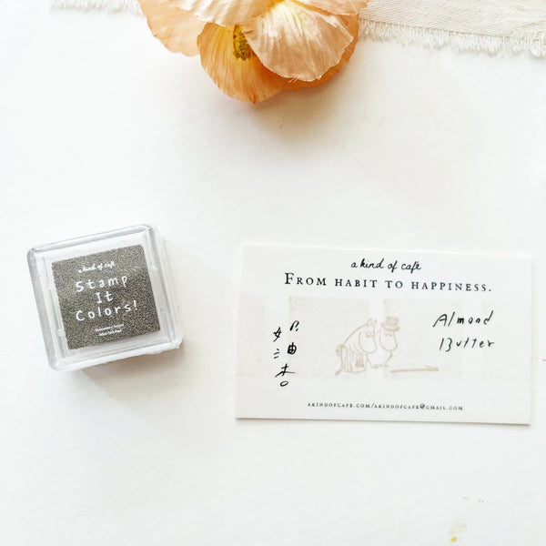 Almond Butter Stamp Ink Pad by a kind of cafe with a card and flower on a white background