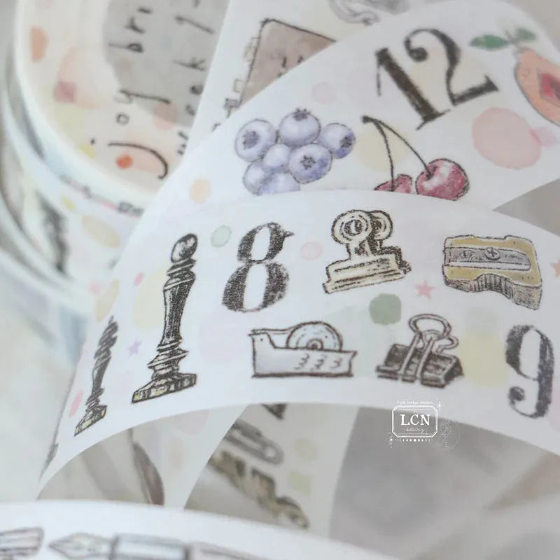 Roll of decorative tape with numbers and illustrations on a white background