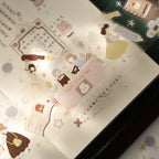 Set of decorative stickers with cartoon characters on a light surface