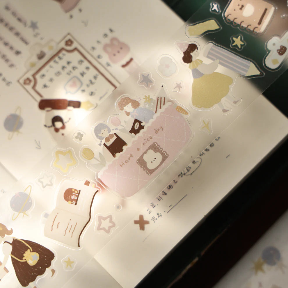 Stationery Planet PET Tape cartoon character stickers laid out on a light surface