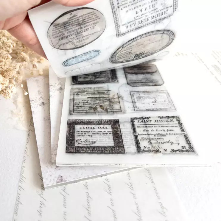 The Vintage One Sticker Book label strip with vintage black text on a white background