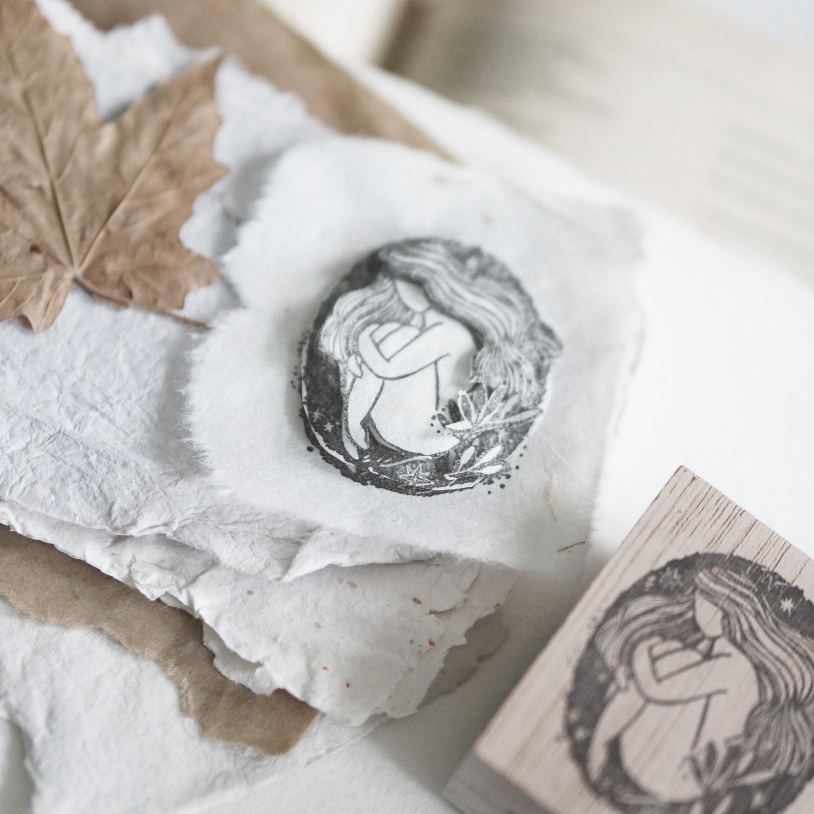 Alternate view of the Stillness Rubber Stamp showing the stamp and its gentle impression