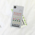 Sheet of stickers with movie-themed designs on a white background