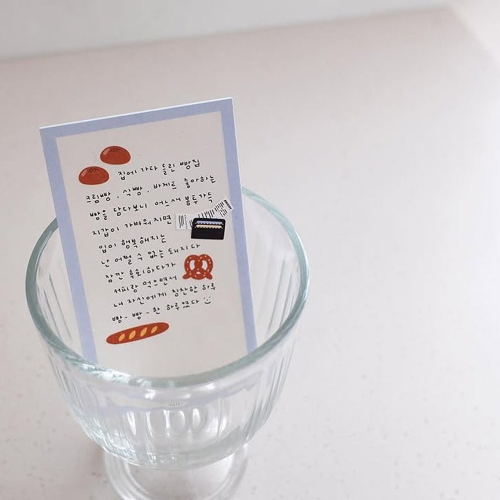 Card with illustrations and text inside a glass container, from the Food Trip 7 Sticker Sheet