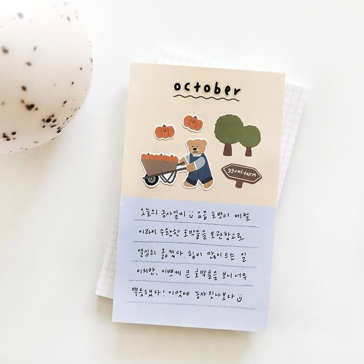 Notebook with a bear illustration and 'October' text, from the Ggumi Farm Sticker Sheet