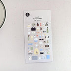 Sheet of daily deco stickers with various small images on a white background