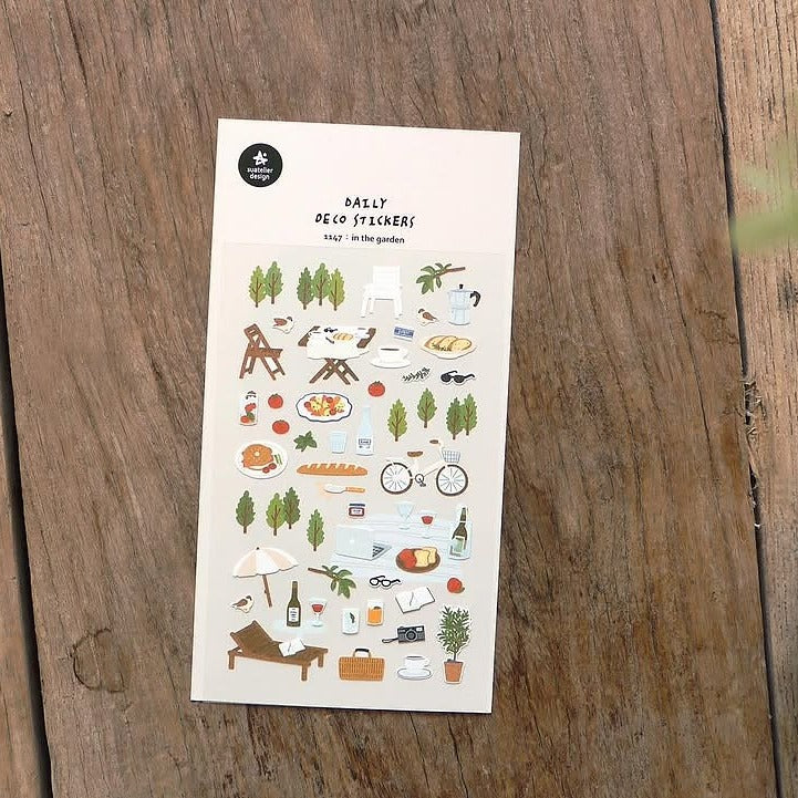 In The Garden Sticker Sheet by Suatelier, decorative stickers on a wooden surface