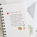 Notebook page with Korean text and illustrations on a white background