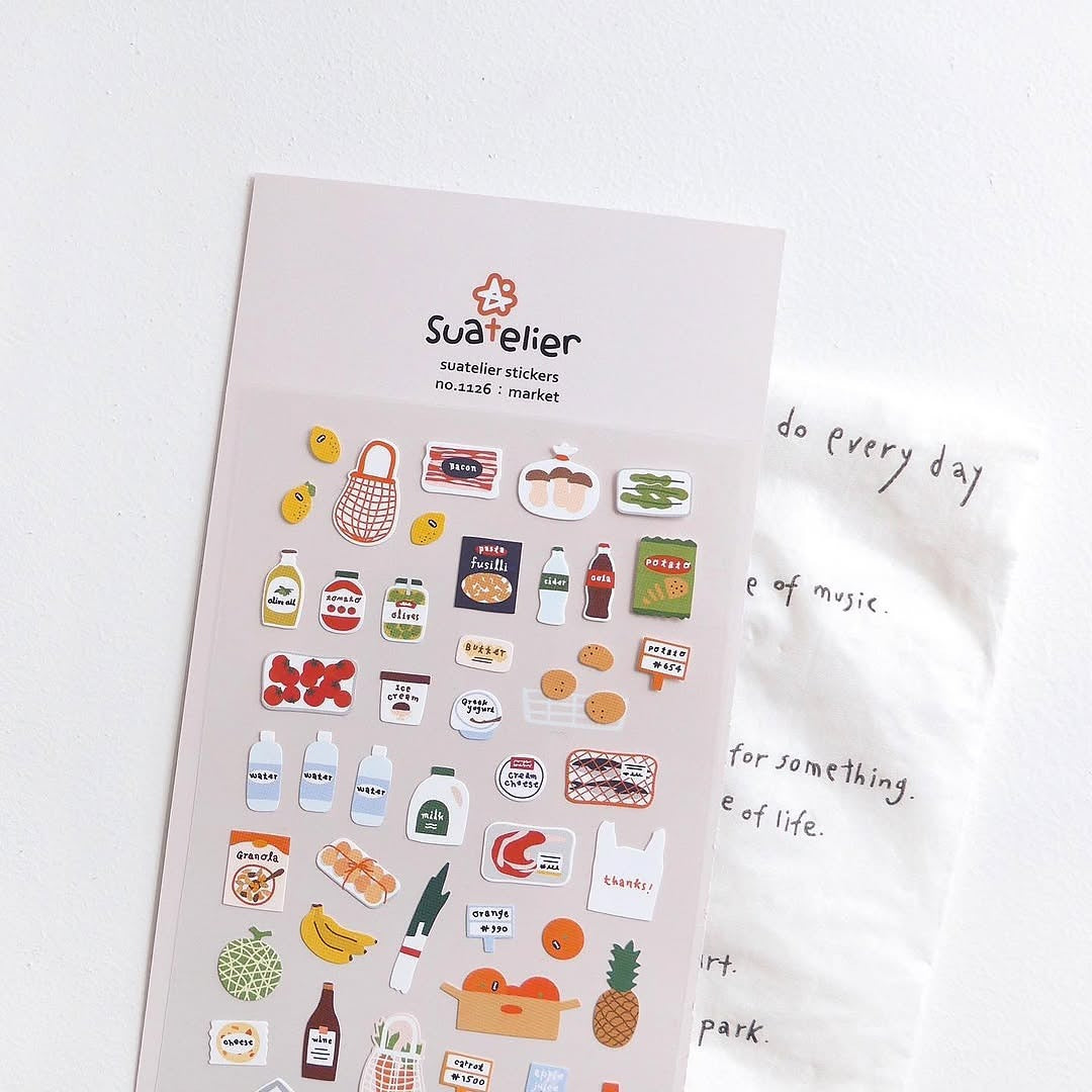 Sheet of Suatelier stickers with various illustrations on a white background