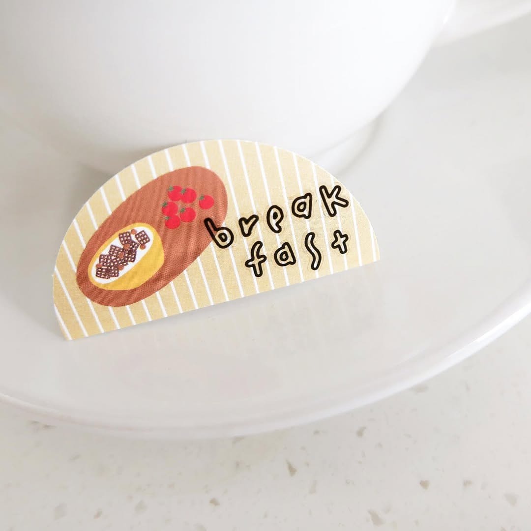 Decorative plate with a papaya illustration and 'break fast' text, from the Good Morning! Sticker Sheet