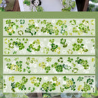 Set of green floral washi tape strips on a light green background