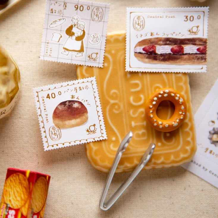 Sweet Hours Stamp Sticker Sheet by OURS Studio — biscuit-shaped tin with stamp stickers and tongs, for journaling