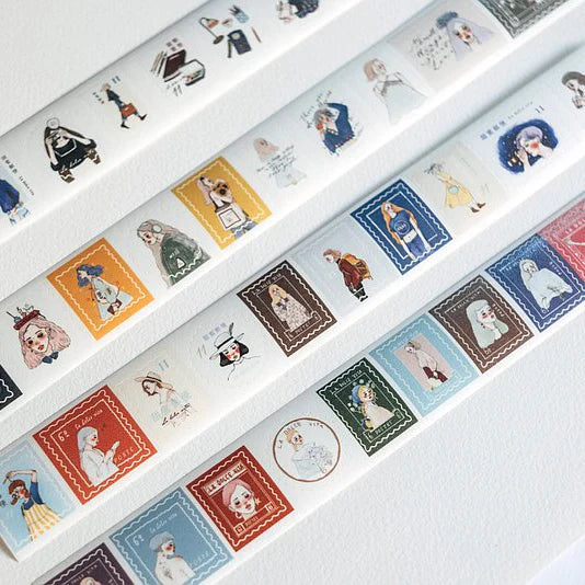 Set of decorative tape rolls with cartoon character designs on a white background