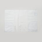 White textured paper with a subtle pattern on a white background