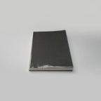 Black rectangular object on a gray background