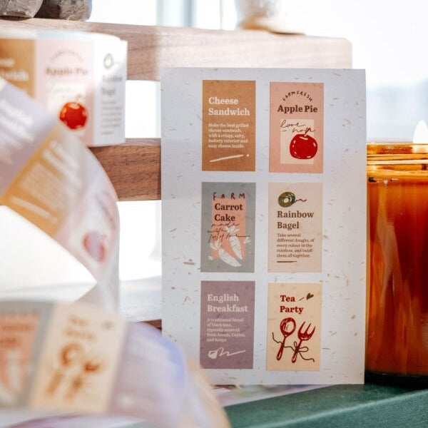 Tea Party Label Sticker Tape styled as tea packaging labels displayed on a wooden shelf