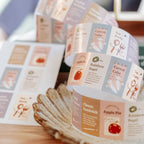 Roll of paper with food product labels on a wooden surface