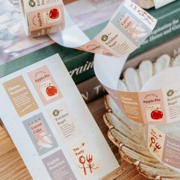 Tea Party Label Sticker Tape labels styled on baked-goods packaging on a wooden surface
