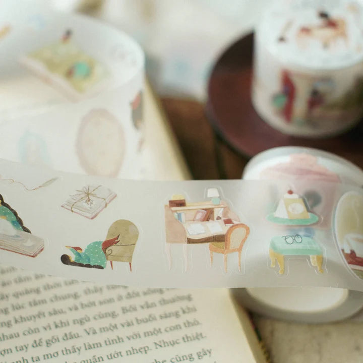 Enchanted Library PET Tape strip with a cozy room and reader illustrations on a book page