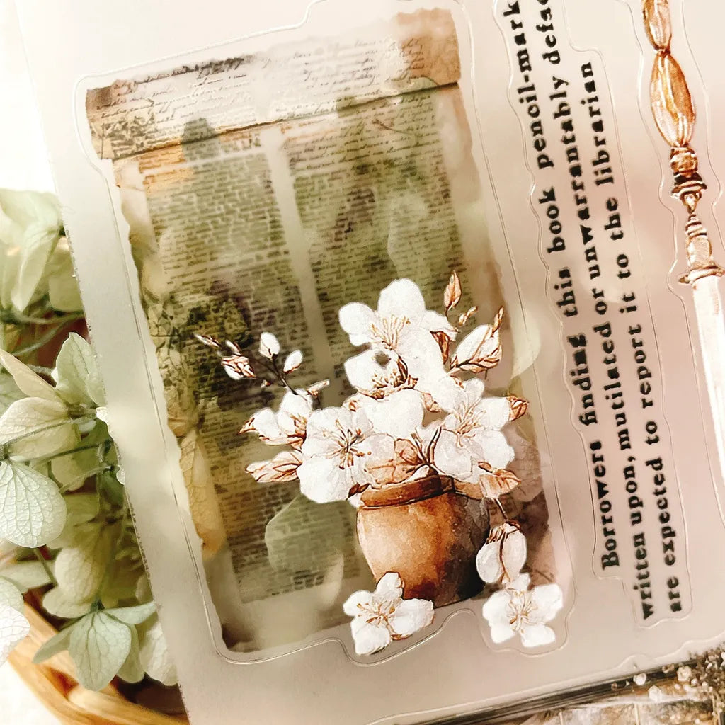 The Cosy Chapter PET Tape book design with floral elements and text overlay, styled view