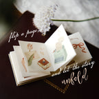 Small book with illustrations of food and flowers, text 'flip a page and let the story unfold', blurred background