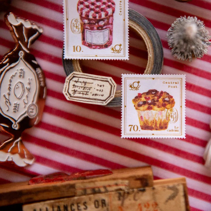 The Gift Stamp Sticker Sheet by OURS Studio — cupcake stamp stickers on striped background, for journaling