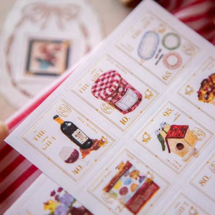 The Gift Stamp Sticker Sheet by OURS Studio — sheet of illustrated stamp stickers, for journaling