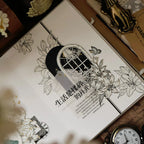 Book with floral illustrations and text on a decorative surface