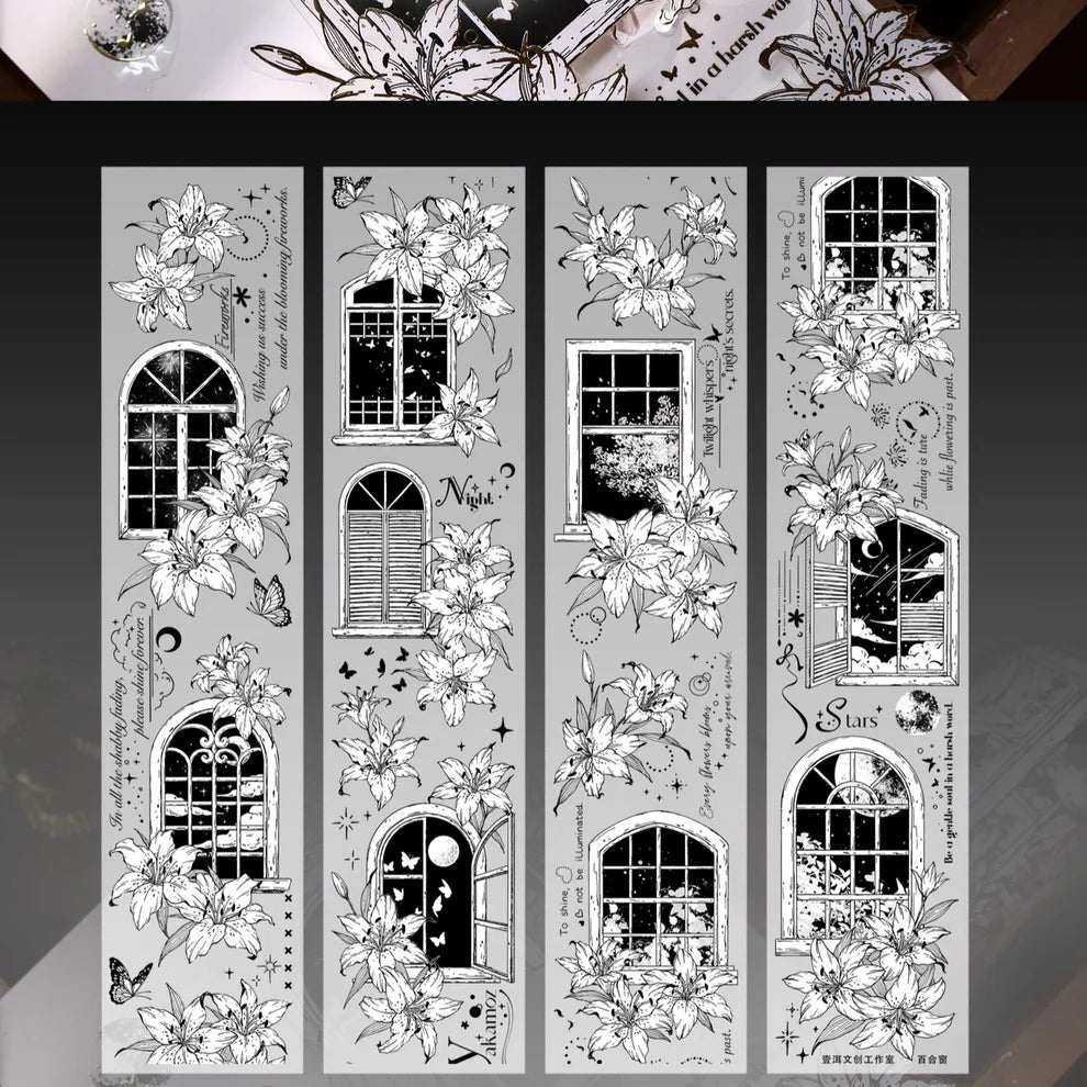 Decorative metal cutting dies with floral and window designs on a gray background
