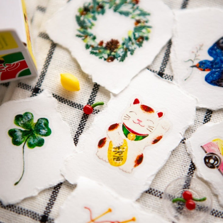 Decorative coasters with various designs on a checkered surface