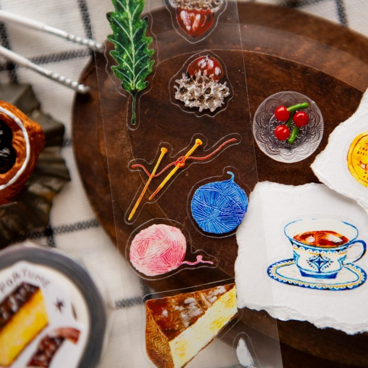 The Fortune PET Tape designs styled like patches on a wooden board, overhead view